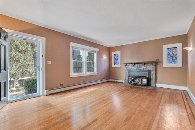 unfurnished living room featuring light wood-type flooring, baseboards, ornamental molding, and baseboard heating