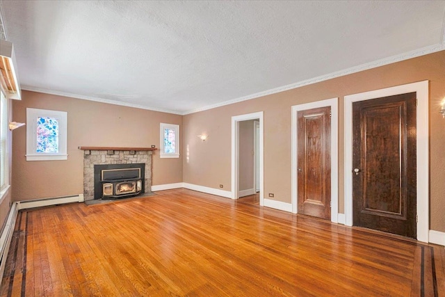 unfurnished living room with crown molding, a baseboard radiator, light wood-style floors, a textured ceiling, and baseboards