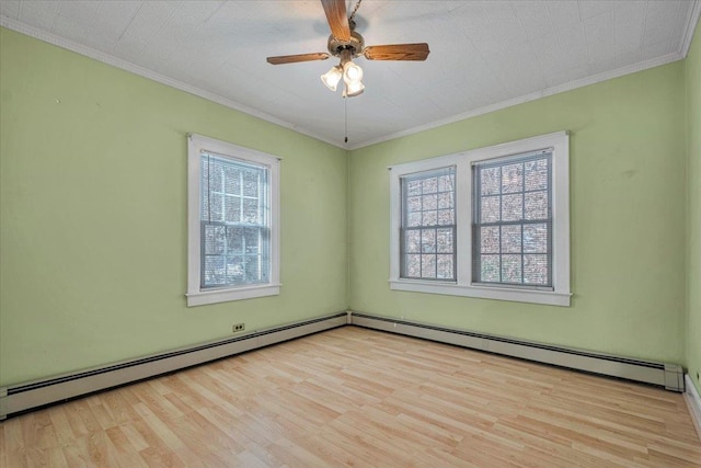 unfurnished room with light wood-style floors, a healthy amount of sunlight, and crown molding