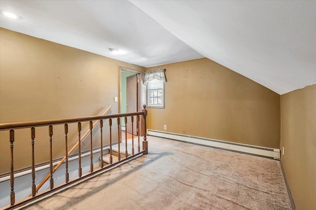 bonus room with light carpet, a baseboard radiator, and vaulted ceiling