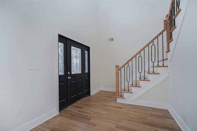 entrance foyer with hardwood / wood-style flooring