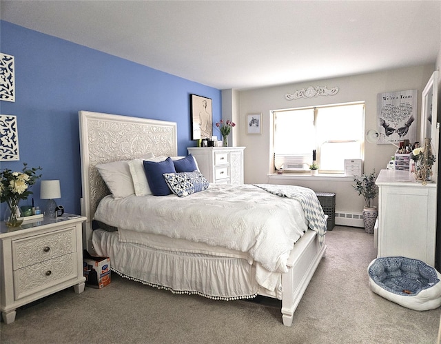 carpeted bedroom featuring a baseboard heating unit and cooling unit