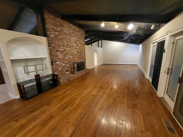 unfurnished living room with built in shelves, lofted ceiling with beams, hardwood / wood-style flooring, a fireplace, and baseboard heating