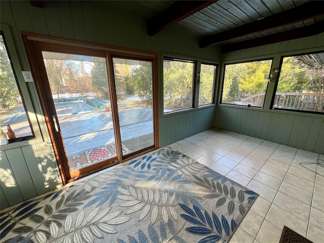 sunroom / solarium featuring wood ceiling and beamed ceiling