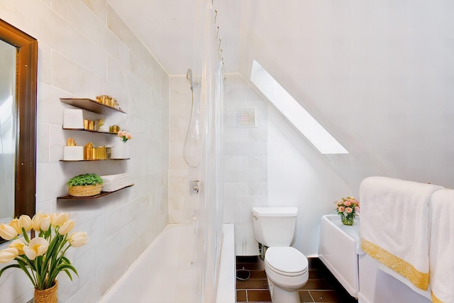 bathroom with shower / tub combo, toilet, and vaulted ceiling