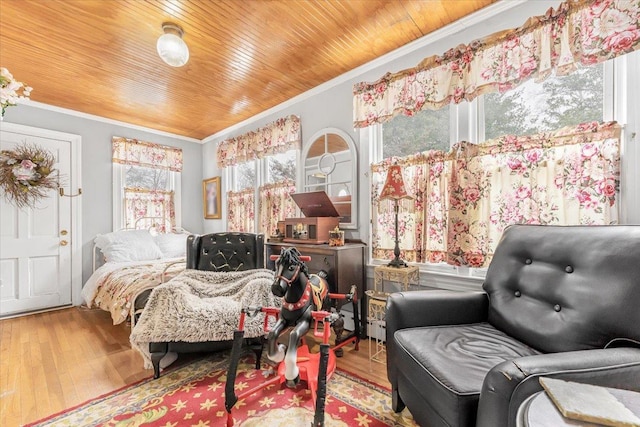 bedroom with wood ceiling, crown molding, and wood-type flooring