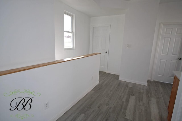 corridor featuring hardwood / wood-style flooring