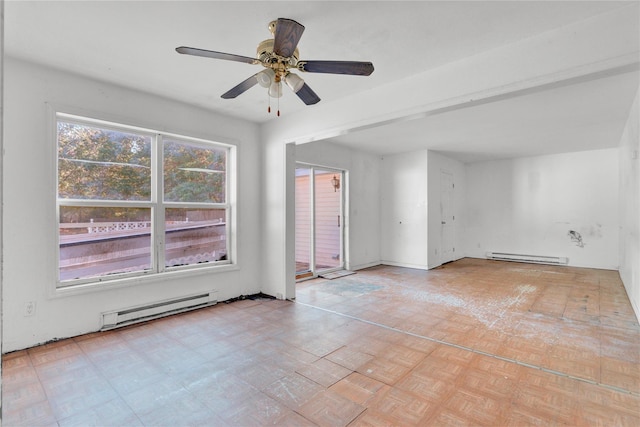 empty room with baseboard heating, ceiling fan, and light parquet floors