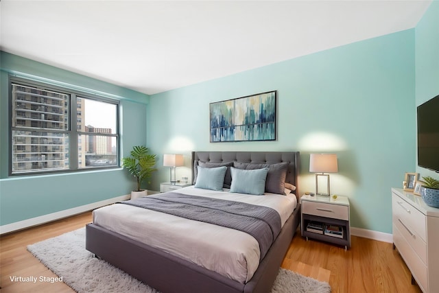 bedroom featuring light hardwood / wood-style floors