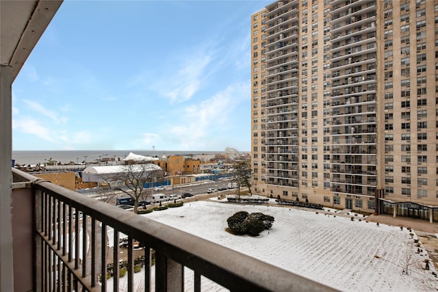 balcony featuring a water view