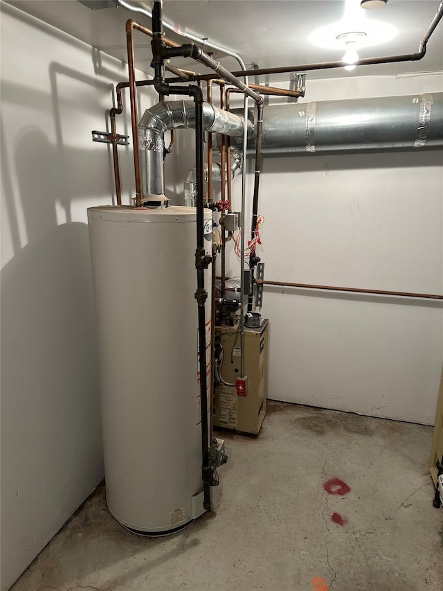 utility room with gas water heater