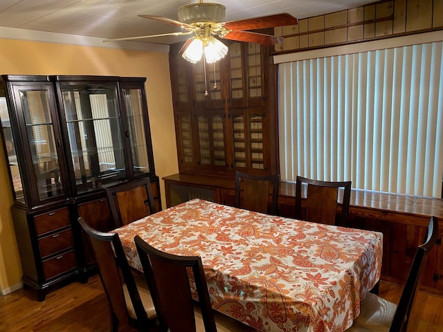 dining room featuring hardwood / wood-style floors and ceiling fan