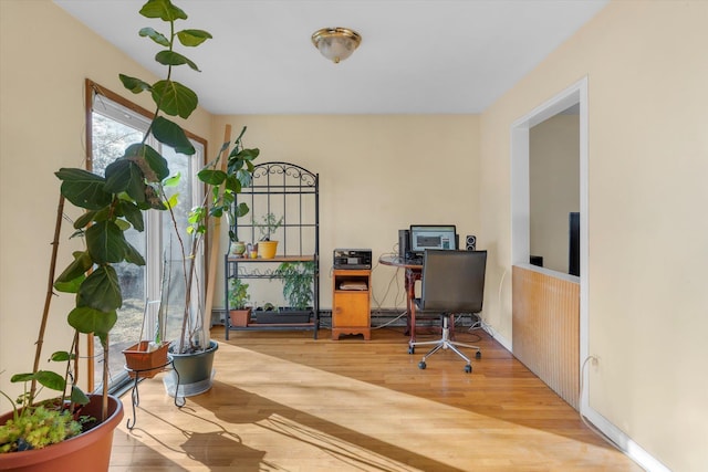 home office featuring wood finished floors