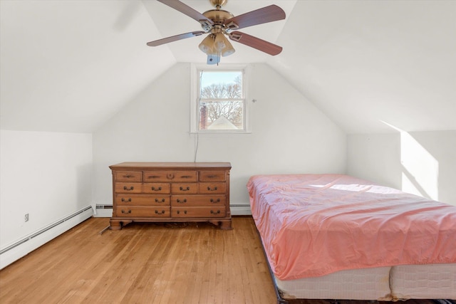 bedroom featuring a baseboard radiator, wood-type flooring, baseboard heating, vaulted ceiling, and ceiling fan