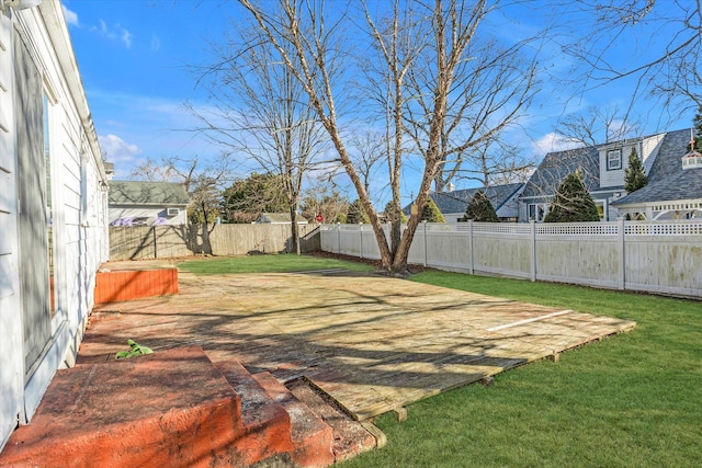 view of yard featuring a fenced backyard