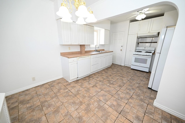 kitchen with light countertops, white appliances, white cabinets, and under cabinet range hood