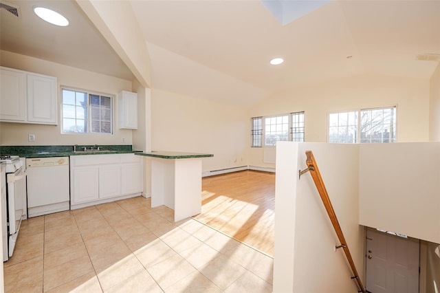 kitchen featuring white cabinetry, lofted ceiling, white appliances, a baseboard radiator, and light tile patterned flooring