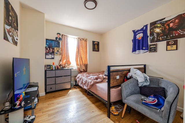 bedroom featuring light hardwood / wood-style floors