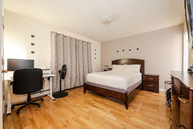 bedroom featuring light wood-type flooring