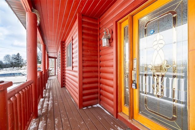 view of snow covered deck