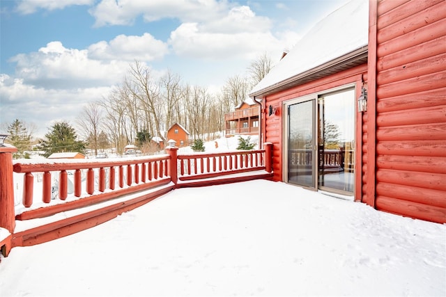 view of snow covered deck