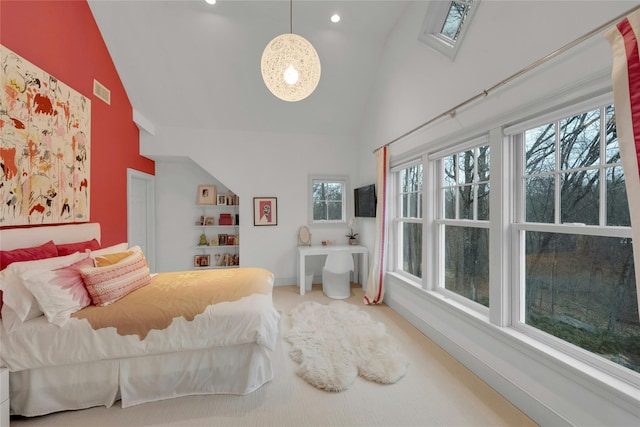 bedroom with visible vents, high vaulted ceiling, baseboards, and carpet floors