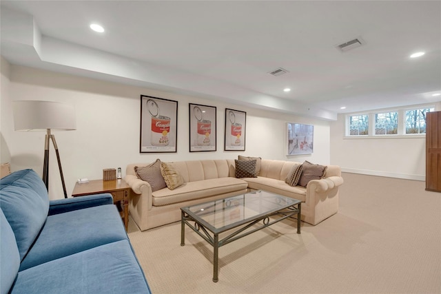 carpeted living room with visible vents, recessed lighting, and baseboards