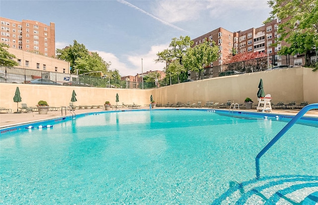 view of swimming pool featuring a patio