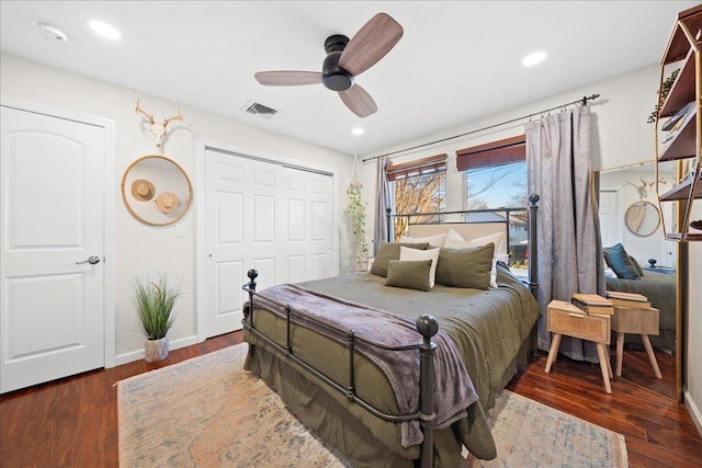 bedroom featuring a closet, visible vents, wood finished floors, and recessed lighting