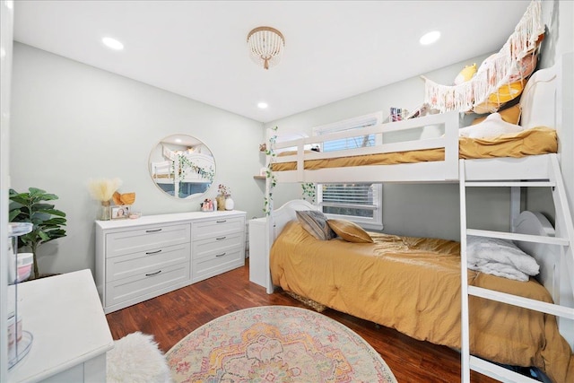 bedroom featuring dark wood-style flooring and recessed lighting