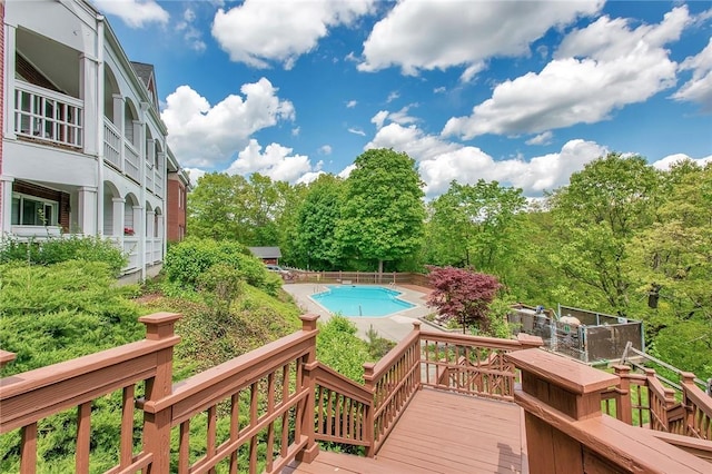 view of pool featuring a wooden deck