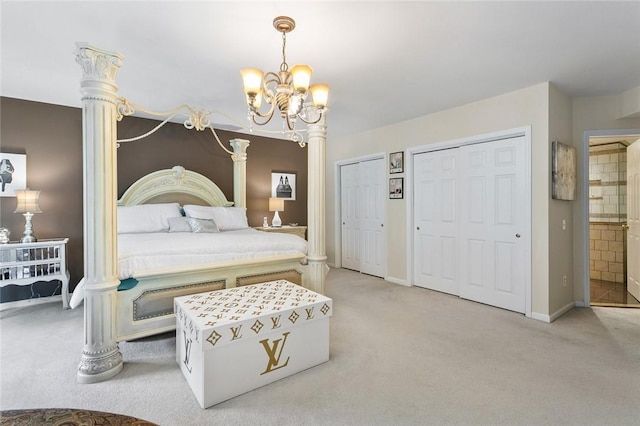 carpeted bedroom featuring multiple closets, decorative columns, and a notable chandelier