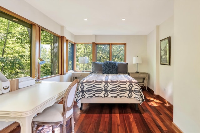 bedroom featuring recessed lighting and wood finished floors