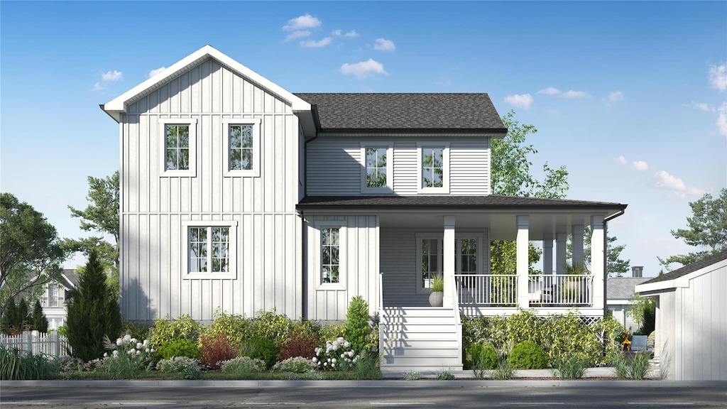 modern farmhouse featuring covered porch, a shingled roof, and board and batten siding