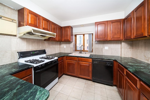 kitchen with gas stove, black dishwasher, sink, backsplash, and dark stone countertops