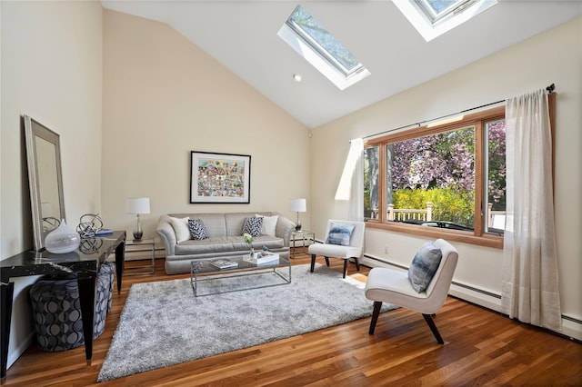 living room featuring wood finished floors, a skylight, a baseboard heating unit, and high vaulted ceiling