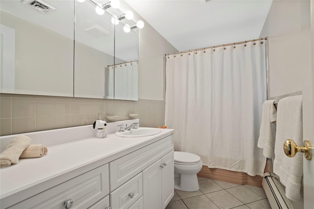 bathroom featuring toilet, a baseboard heating unit, visible vents, tile patterned flooring, and vanity