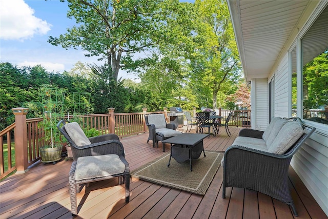 wooden deck with outdoor dining area