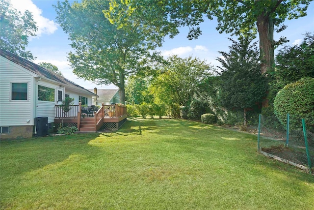 view of yard with a deck