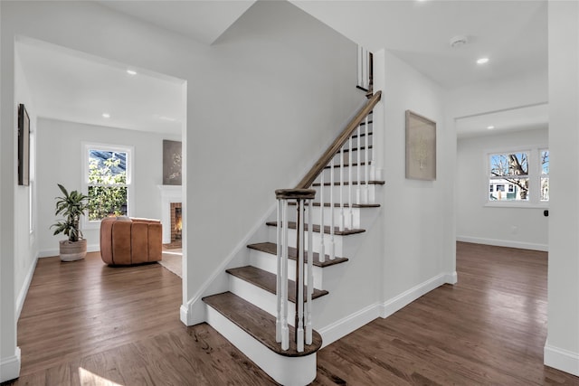 stairway featuring hardwood / wood-style floors