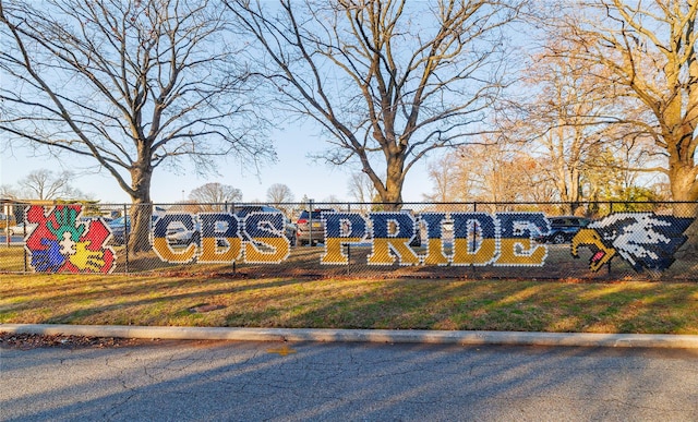 community sign with uncovered parking