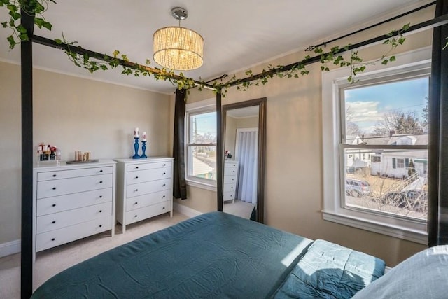 bedroom with an inviting chandelier