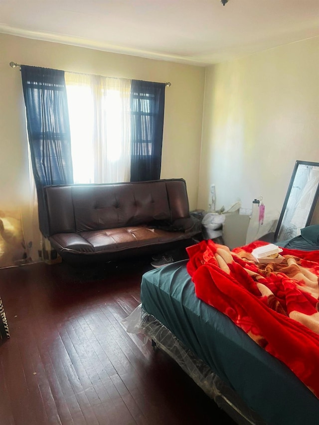 bedroom featuring hardwood / wood-style flooring