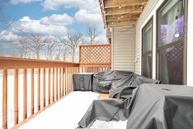 view of snow covered deck