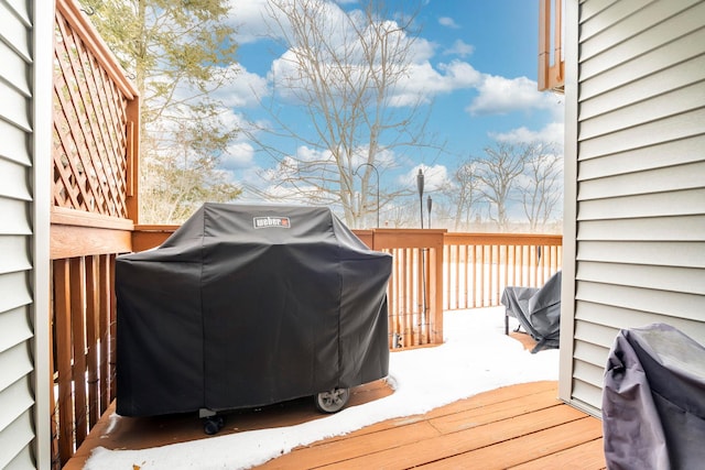 wooden deck featuring grilling area