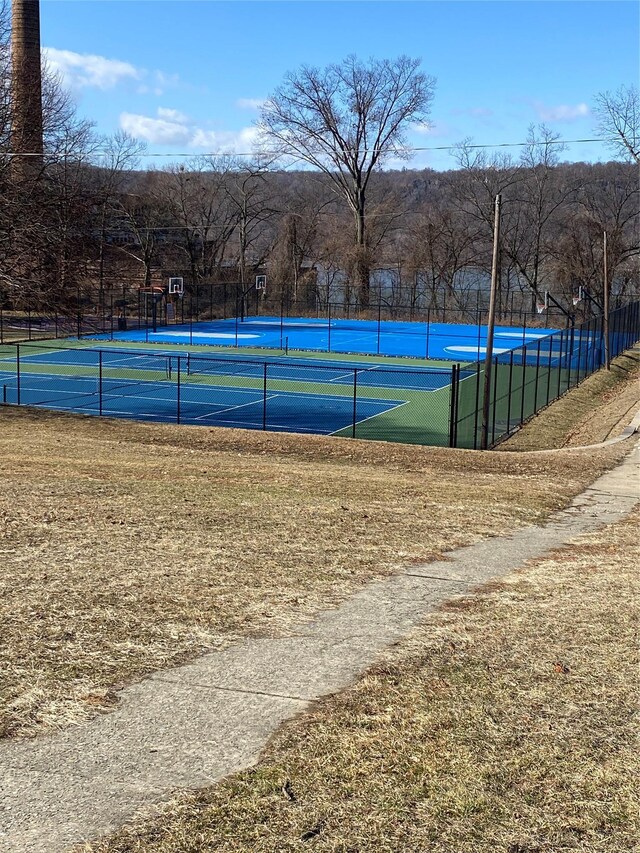 view of sport court with community basketball court and fence