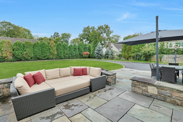 view of patio featuring outdoor lounge area and outdoor dining space