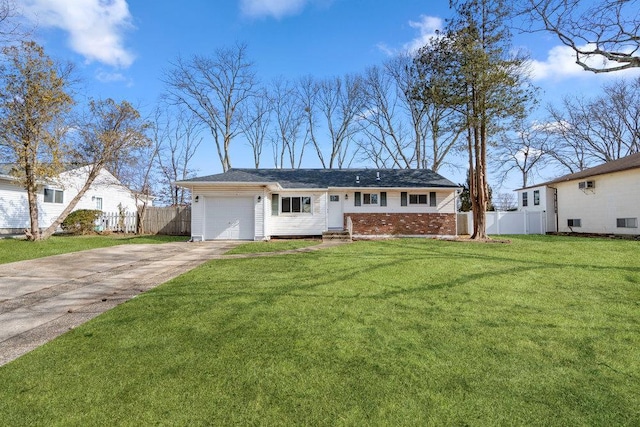 view of front of property featuring a garage, brick siding, fence, concrete driveway, and a front yard