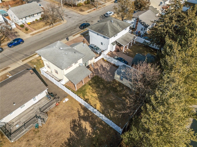 birds eye view of property with a residential view