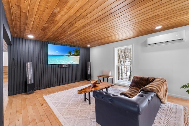 cinema room with light wood-type flooring, wooden ceiling, recessed lighting, and a wall mounted AC